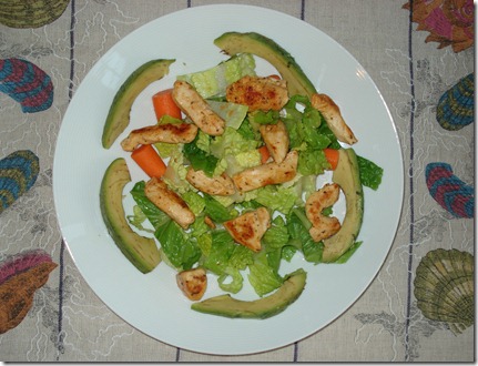 marinated chicken over salad